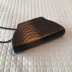 Melian Evening Purse in black faux croc w/gold detail. Detachable strap 10x5x2